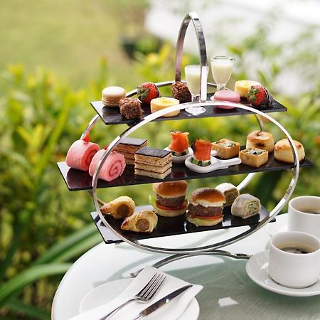 Grand Coloane Resort Macao Esterno foto Afternoon tea at the InterContinental Sanctuary Cove Resort, Queensland, Australia